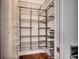 A walk-in pantry offers ample storage with wire shelving and wood flooring at 1348 Peterson St., Myrtle Beach, SC 29577