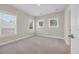 Cozy bedroom with plenty of natural light from three windows at 569 Beckham Ct., Murrells Inlet, SC 29576