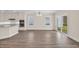 Bright kitchen with granite countertops, stainless appliances, and hardwood flooring at 582 Beckham Ct., Murrells Inlet, SC 29576