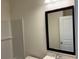 Bathroom with white subway tiles, granite counters and a framed mirror at 2275 King Farm Rd., Aynor, SC 29511