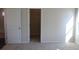 Bedroom view showing closet and window with carpeted floor at 2275 King Farm Rd., Aynor, SC 29511