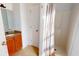 Clean bathroom with shower and wood vanity at 3565 Fountain Ln. # 3565, Myrtle Beach, SC 29577