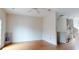Spacious living room with hardwood floors and ceiling fan at 3565 Fountain Ln. # 3565, Myrtle Beach, SC 29577