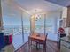 Inviting dining area with natural light from large windows and hardwood flooring for an elegant dining space at 9650 Shore Dr. # 1906, Myrtle Beach, SC 29572