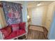 Charming hallway with decorative tapestry, a comfortable bench, and elegant decor at 9650 Shore Dr. # 1906, Myrtle Beach, SC 29572