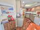 Open-concept kitchen with hardwood floors, ample cabinetry, and convenient access to adjoining rooms at 9650 Shore Dr. # 1906, Myrtle Beach, SC 29572