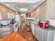 Spacious kitchen offering great counter space, storage and a view of adjoining room with hardwood flooring at 9650 Shore Dr. # 1906, Myrtle Beach, SC 29572