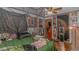 Bedroom with eclectic decor, draped canopy bed, and unique wall art at 305 Resort Dr. # C12, Myrtle Beach, SC 29588