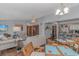 Spacious living room with an open floor plan, seamlessly connecting the kitchen, dining, and seating areas at 305 Resort Dr. # C12, Myrtle Beach, SC 29588