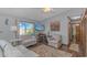 Inviting living room with sliding glass doors, TV, ceiling fan, and decorative accents at 305 Resort Dr. # C12, Myrtle Beach, SC 29588
