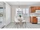 Charming breakfast nook with bright windows and views, attached to the kitchen space at 404 32Nd Ave. N, North Myrtle Beach, SC 29582