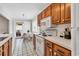 Kitchenette with an adjoining breakfast nook, access to an outdoor patio and ample natural light at 404 32Nd Ave. N, North Myrtle Beach, SC 29582