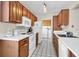 Functional laundry room with white appliances and ample cabinet space at 404 32Nd Ave. N, North Myrtle Beach, SC 29582