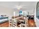Open-concept living space with dining area, living room, and natural light at 404 32Nd Ave. N, North Myrtle Beach, SC 29582