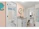 Hallway bathroom with granite counter, white cabinets and shower-tub combo at 6000 N Ocean Blvd. # 330, North Myrtle Beach, SC 29582
