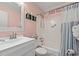 Cozy bathroom featuring a shower-tub combo, vanity, and beach-themed decor at 6000 N Ocean Blvd. # 330, North Myrtle Beach, SC 29582
