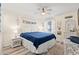 Comfortable bedroom featuring a queen size bed, ceiling fan, and coastal-themed decor at 6000 N Ocean Blvd. # 330, North Myrtle Beach, SC 29582