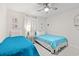 Quaint bedroom featuring two twin beds, a ceiling fan, and coastal decor at 6000 N Ocean Blvd. # 330, North Myrtle Beach, SC 29582