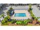Aerial view of a refreshing community pool with lounge chairs at 6000 N Ocean Blvd. # 330, North Myrtle Beach, SC 29582