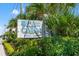 Attractive Sea Cabin Cherry Grove sign with flowers and landscaping at 6000 N Ocean Blvd. # 330, North Myrtle Beach, SC 29582