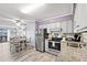 Well lit kitchen with stainless steel appliances and breakfast nook at 6000 N Ocean Blvd. # 330, North Myrtle Beach, SC 29582