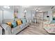 Inviting living room with modern coastal decor and ample natural light at 6000 N Ocean Blvd. # 330, North Myrtle Beach, SC 29582