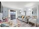 Coastal living room with lots of natural light and balcony access at 6000 N Ocean Blvd. # 330, North Myrtle Beach, SC 29582