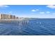 Coastal view featuring a pier with nearby buildings and a sandy beach at 6000 N Ocean Blvd. # 330, North Myrtle Beach, SC 29582