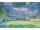 Large backyard with a grassy area and wooden fence at 1437 Shoreline Dr., Myrtle Beach, SC 29577