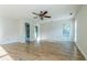 Primary bedroom with wood flooring and access to a private bath and backyard at 1437 Shoreline Dr., Myrtle Beach, SC 29577