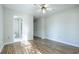 Bedroom with wood floors and access to bathroom at 1437 Shoreline Dr., Myrtle Beach, SC 29577