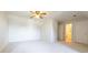 Bright bedroom featuring carpet, ceiling fan and private bath at 1437 Shoreline Dr., Myrtle Beach, SC 29577