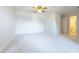 Bedroom with carpet, ceiling fan and access to a private bath at 1437 Shoreline Dr., Myrtle Beach, SC 29577
