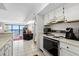 Open kitchen with view of living room and ocean at 2500 N Ocean Blvd. # 616, North Myrtle Beach, SC 29582