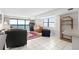 Living room with ocean view, comfortable seating, and tiled floor at 2500 N Ocean Blvd. # 616, North Myrtle Beach, SC 29582