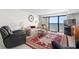 Living room with ocean view, comfortable seating, and tiled floor at 2500 N Ocean Blvd. # 616, North Myrtle Beach, SC 29582