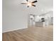 Open living area with vinyl plank flooring and a view into the kitchen at 1130 Cypress Shoal Dr., Conway, SC 29526