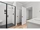 Modern bathroom with a large walk-in shower and a built-in bench at 1409 Crooked Hook Rd., North Myrtle Beach, SC 29582