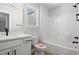 Modern bathroom with white vanity and shower at 1409 Crooked Hook Rd., North Myrtle Beach, SC 29582