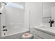 Clean bathroom with white vanity and bathtub at 1409 Crooked Hook Rd., North Myrtle Beach, SC 29582