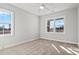 Spacious bedroom with two windows and carpet at 1409 Crooked Hook Rd., North Myrtle Beach, SC 29582