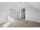 Bright bedroom with carpet, ceiling fan, and mini-split air conditioner at 1409 Crooked Hook Rd., North Myrtle Beach, SC 29582