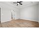 Spacious bedroom with ceiling fan and large window at 1409 Crooked Hook Rd., North Myrtle Beach, SC 29582