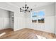 Bright dining room with wainscoting and a large window at 1409 Crooked Hook Rd., North Myrtle Beach, SC 29582
