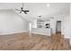 Open kitchen with island, stainless steel appliances and light-colored cabinetry at 1409 Crooked Hook Rd., North Myrtle Beach, SC 29582