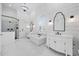 Bright bathroom featuring white shiplap walls, a soaking tub, and dual vanities at 9318 Cove Dr., Myrtle Beach, SC 29572