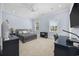 Bright blue bedroom with a ceiling fan, gray bed, and a built-in desk area at 9318 Cove Dr., Myrtle Beach, SC 29572