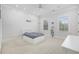 Comfortable bedroom with shiplap accent wall, plush carpet, and a cozy twin-sized bed at 9318 Cove Dr., Myrtle Beach, SC 29572