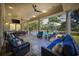 Beautiful covered patio with plenty of room for seating, dining and entertaining poolside at 9318 Cove Dr., Myrtle Beach, SC 29572