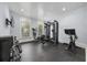Well-equipped home gym with modern exercise equipment and natural light at 9318 Cove Dr., Myrtle Beach, SC 29572